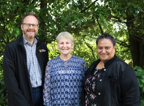 Trust Waikato Co-Deputy Chairs and Chairperson smiling.