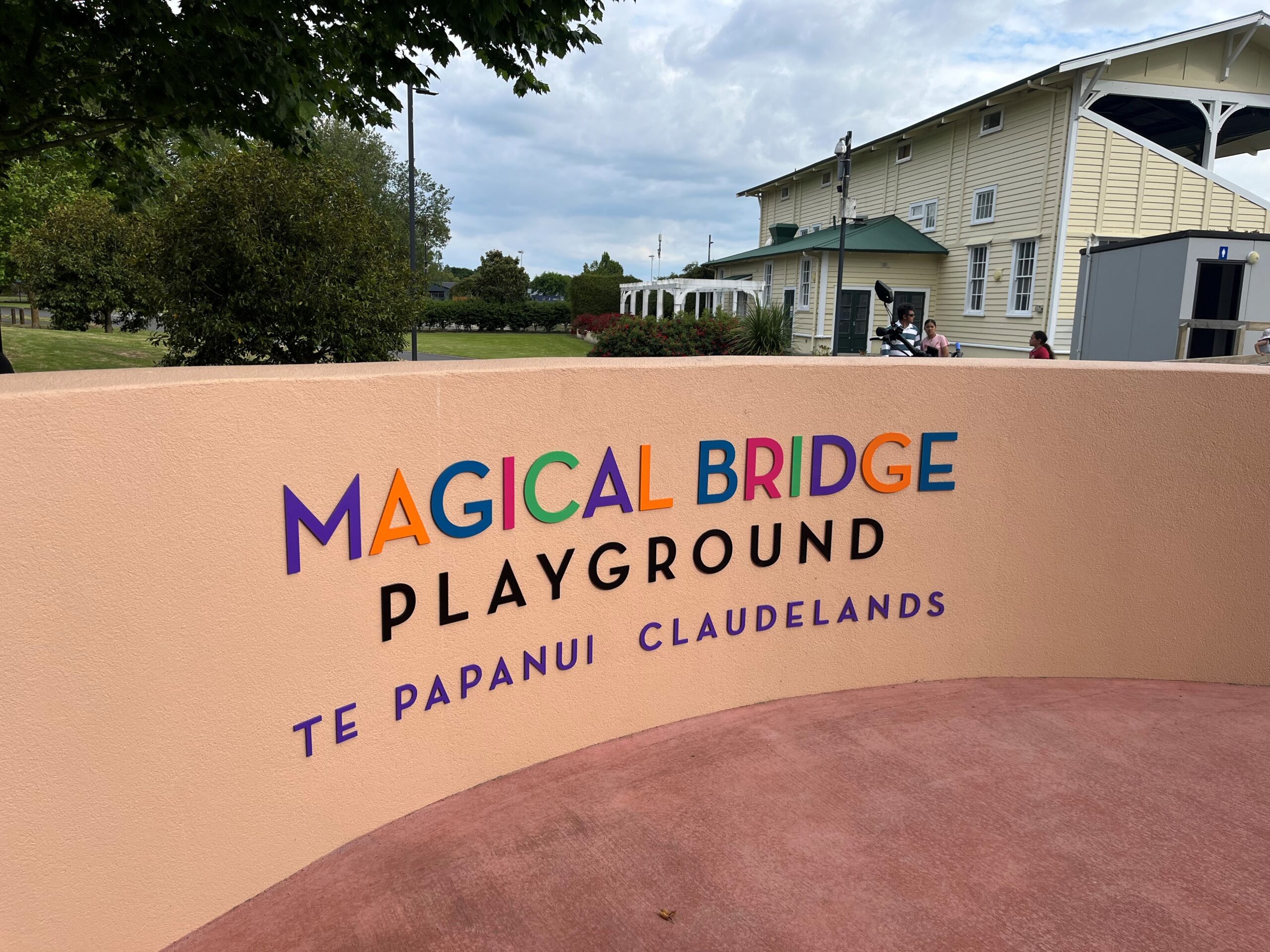 The welcome sign of the Magical Bridge Playground - Te Papanui Claudelands.