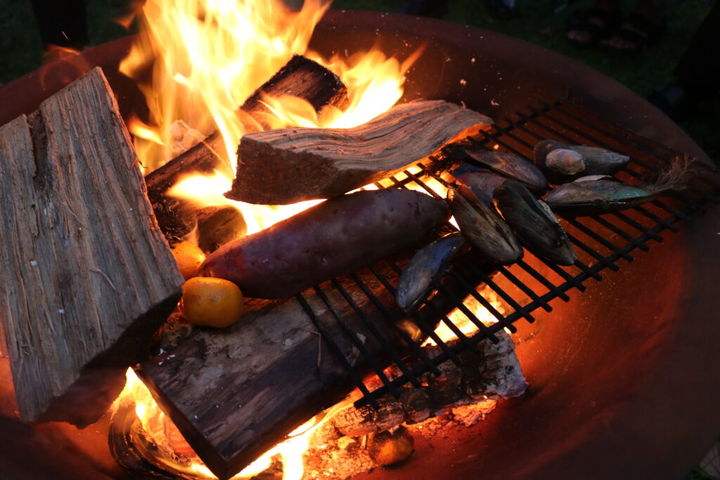 Food offerings to Matariki in the fire pit. 